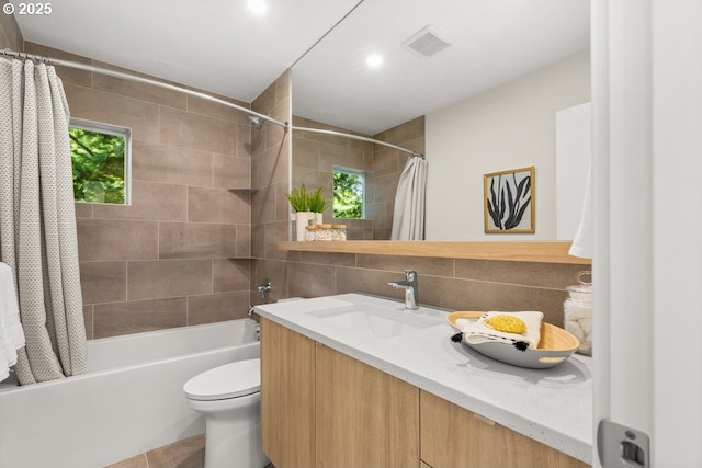2415 NE 38th Ave Unit B, Portland, OR 97212 - full bathroom with vanity, shower / bath combo with shower curtain, and tile walls