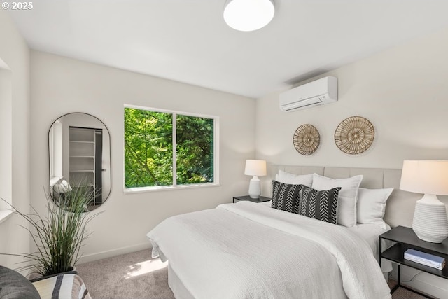 2415 NE 38th Ave Unit B, Portland, OR 97212 - bedroom featuring a wall mounted air conditioner and carpet flooring