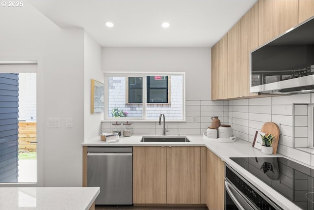 2415 NE 38th Ave Unit B, Portland, OR 97212 - kitchen featuring stainless steel appliances, modern cabinets, light brown cabinetry, tasteful backsplash, and recessed lighting