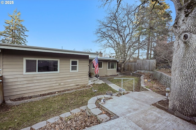 view of front of house with a patio area