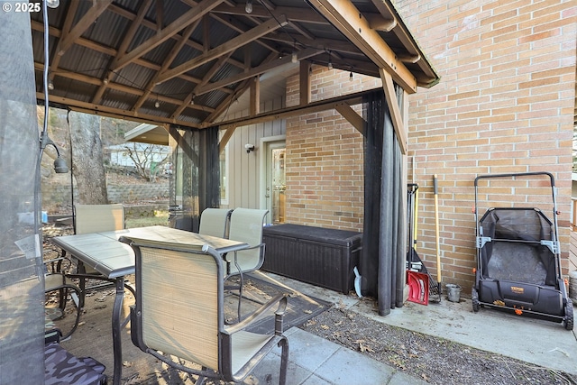 view of patio featuring outdoor dining area