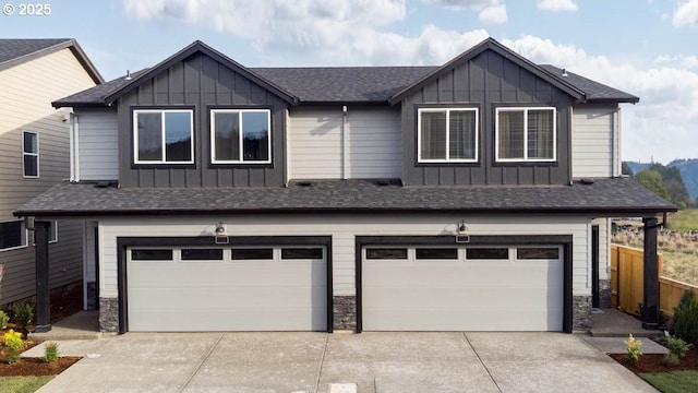9336 SE Middleton St, Happy Valley, OR 97086 - craftsman-style home featuring board and batten siding, an attached garage, and stone siding