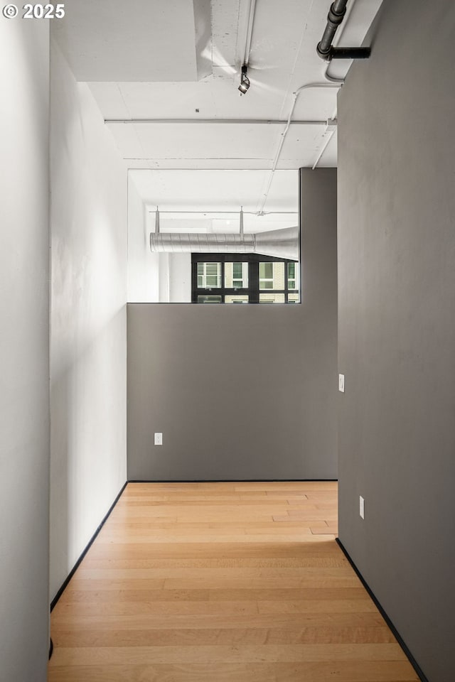 empty room featuring wood finished floors