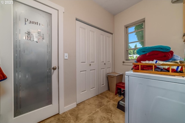 48482 E Meadow Way, Oakridge, OR 97463 - laundry room with washer / dryer and light tile patterned floors