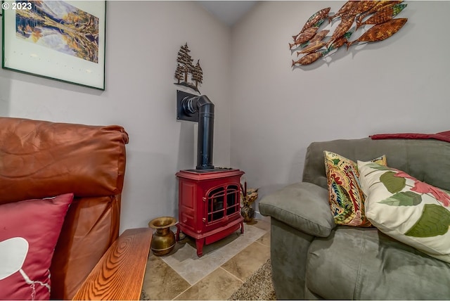 48482 E Meadow Way, Oakridge, OR 97463 - living area with a wood stove and tile patterned flooring