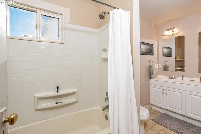 full bathroom featuring vanity, shower / tub combo with curtain, tile patterned floors, and toilet