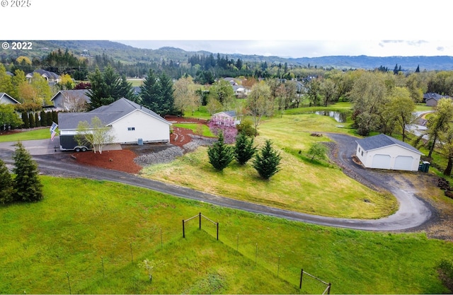 drone / aerial view featuring a mountain view