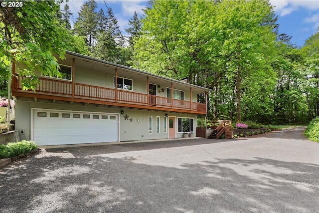 29806 Lusk Rd, Eugene, OR 97405 - front facade featuring asphalt driveway and an attached garage