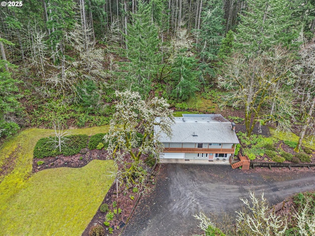 aerial view featuring a forest view