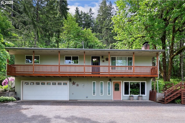 29806 Lusk Rd, Eugene, OR 97405 - view of front of property with a chimney, driveway, and an attached garage