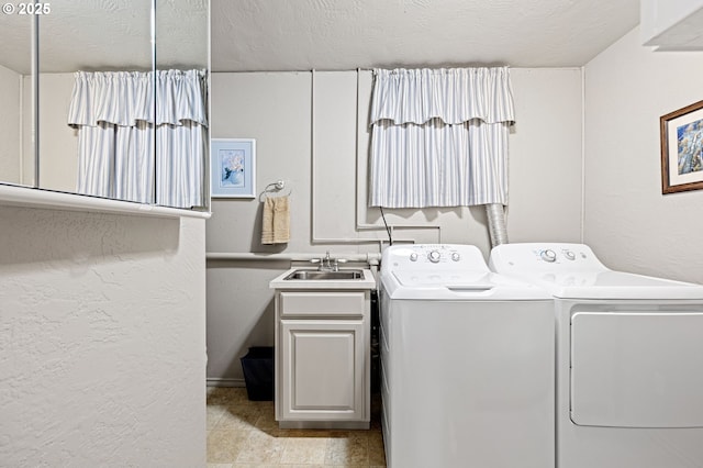 29806 Lusk Rd, Eugene, OR 97405 - washroom featuring washing machine and dryer, a textured wall, a textured ceiling, and cabinet space