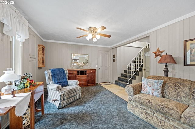 29806 Lusk Rd, Eugene, OR 97405 - living area featuring stairway, crown molding, ceiling fan, and carpet flooring