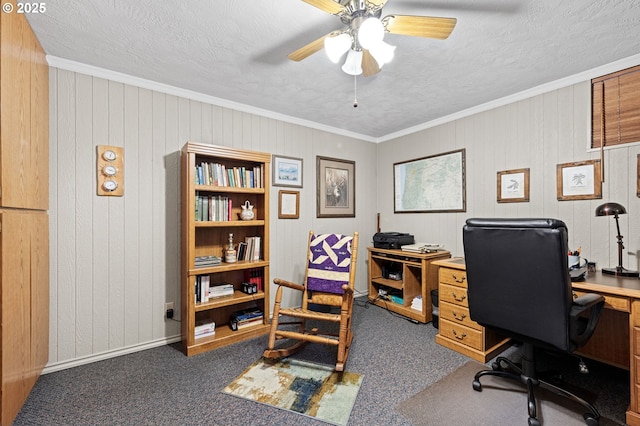 29806 Lusk Rd, Eugene, OR 97405 - home office with crown molding, carpet flooring, a ceiling fan, a textured ceiling, and wooden walls