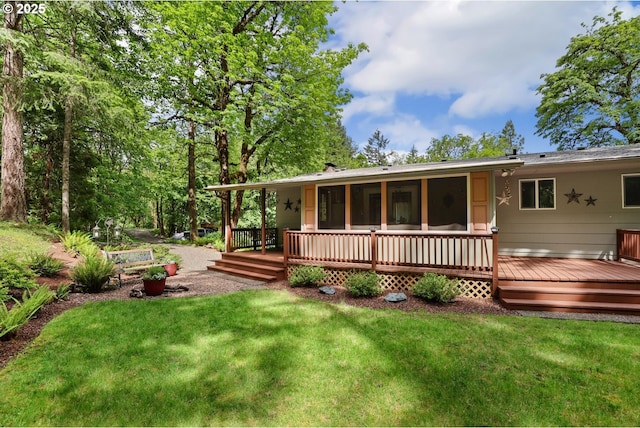 29806 Lusk Rd, Eugene, OR 97405 - rear view of property with a lawn and a wooden deck
