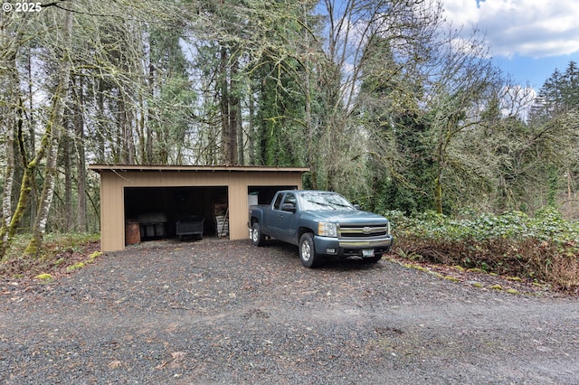 29806 Lusk Rd, Eugene, OR 97405 - garage featuring a view of trees