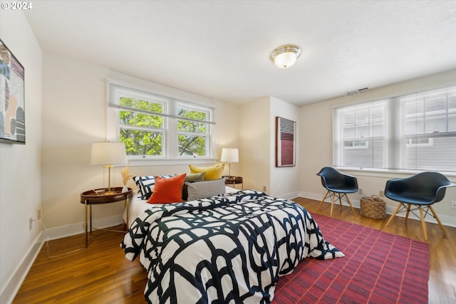 1224 SE Malden St, Portland, OR 97202 - bedroom featuring wood finished floors