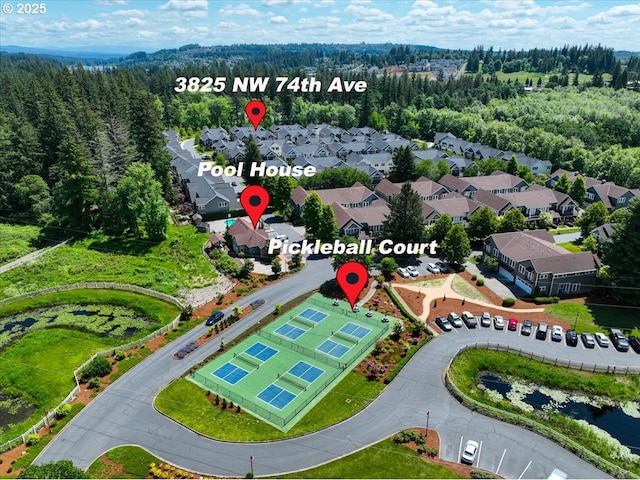 3825 NW 74th Ave Unit 59, Camas, WA 98607 - aerial view of residential area with a heavily wooded area