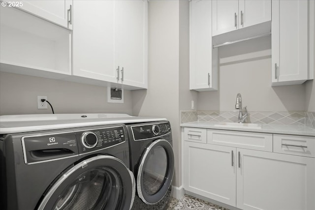 3825 NW 74th Ave Unit 59, Camas, WA 98607 - laundry area featuring washer and dryer and cabinet space