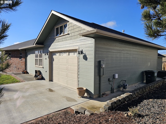 view of home's exterior featuring a garage