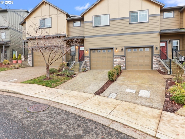 multi unit property featuring a garage