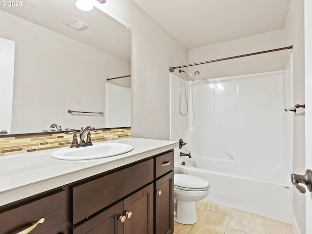 full bathroom featuring shower / tub combination, backsplash, vanity, tile patterned floors, and toilet