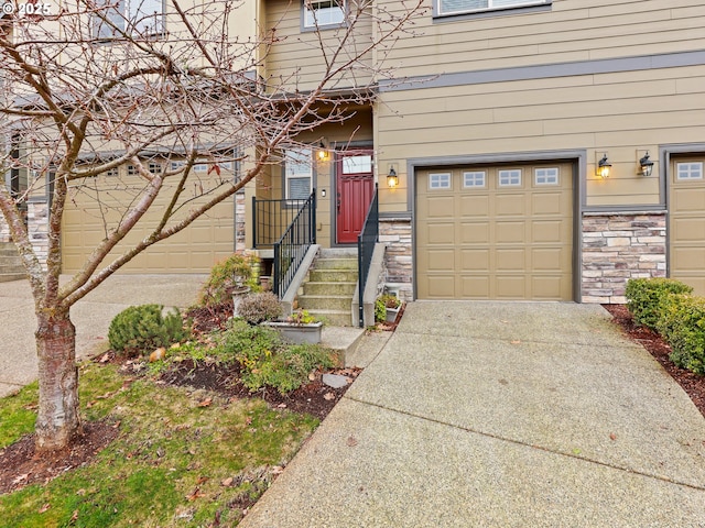 view of exterior entry featuring a garage