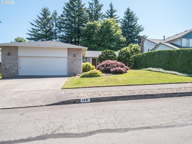 140 NE Greenway Dr, Gresham, OR 97030 - view of front facade with brick siding, concrete driveway, an attached garage, and a front yard