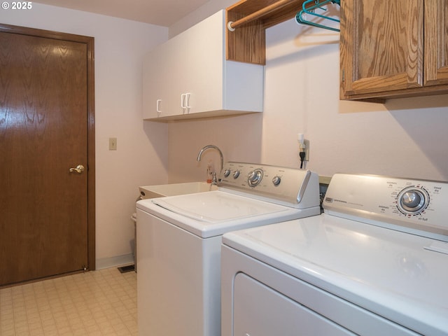 140 NE Greenway Dr, Gresham, OR 97030 - laundry area with independent washer and dryer, cabinet space, and light floors