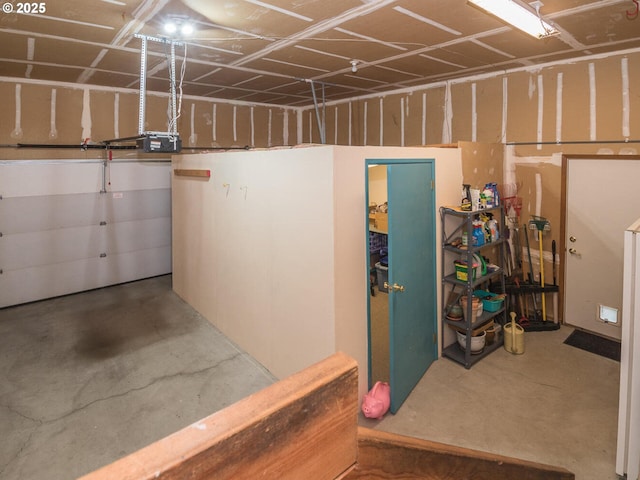 140 NE Greenway Dr, Gresham, OR 97030 - garage featuring a garage door opener