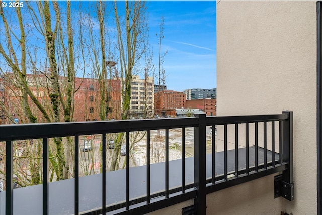 balcony featuring a city view