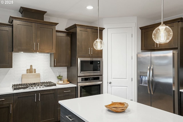 301 W 17th St, Lafayette, OR 97127 - kitchen featuring stainless steel appliances, light countertops, dark brown cabinets, and recessed lighting