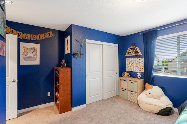 301 W 17th St, Lafayette, OR 97127 - bedroom with light colored carpet, baseboards, and a closet