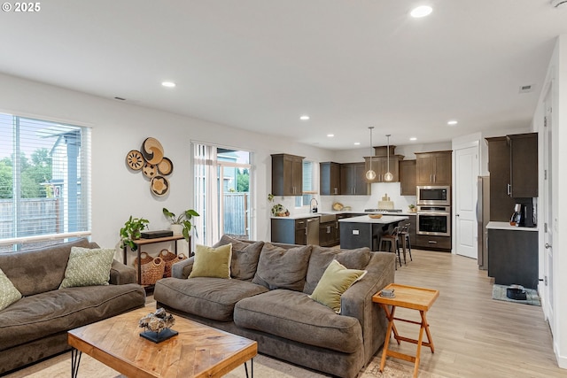 301 W 17th St, Lafayette, OR 97127 - living room featuring recessed lighting and light wood-style flooring