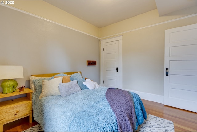 8113 SE Morrison St, Portland, OR 97215 - bedroom with wood finished floors and baseboards