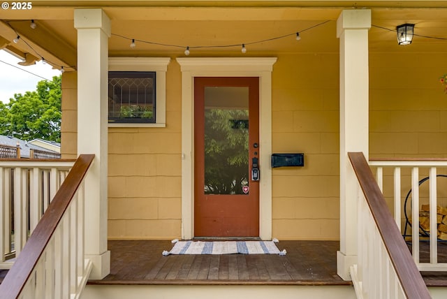 8113 SE Morrison St, Portland, OR 97215 - view of exterior entry featuring covered porch