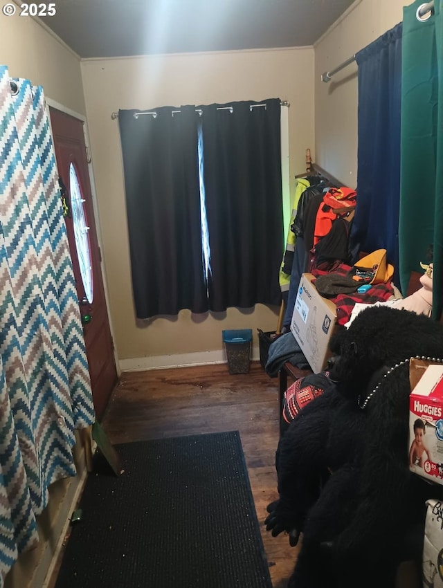 bedroom with wood finished floors