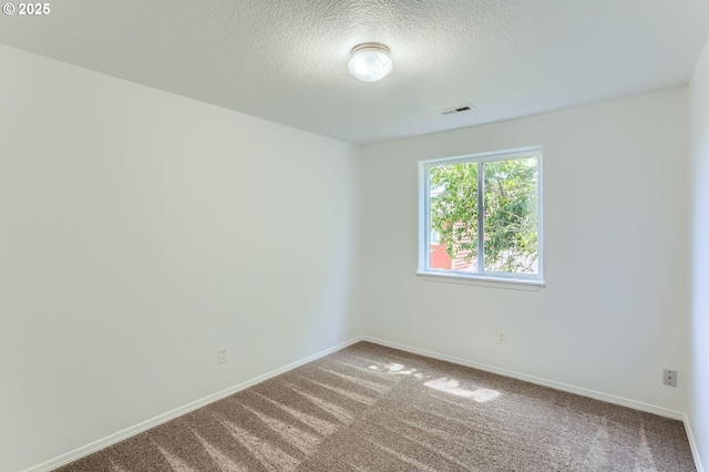 2482 25th Ave, Forest Grove, OR 97116 - carpeted empty room with a textured ceiling