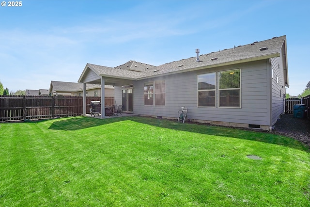 back of house with a lawn, a patio, fence, and crawl space