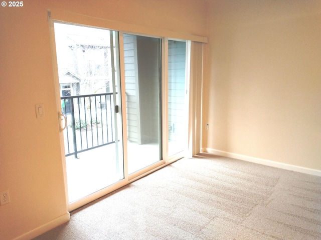 view of carpeted spare room