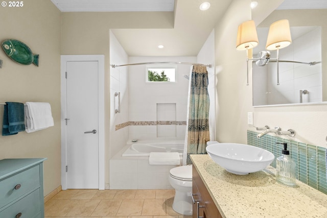 bathroom featuring vanity, tile patterned floors, and toilet