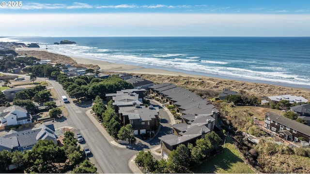 aerial view with a view of the beach and a water view