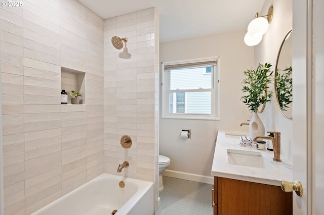 full bathroom with toilet, a sink, tile patterned flooring, double vanity, and baseboards