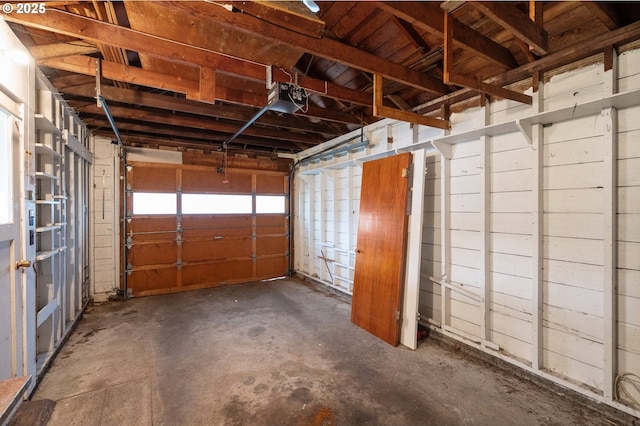 garage featuring a garage door opener