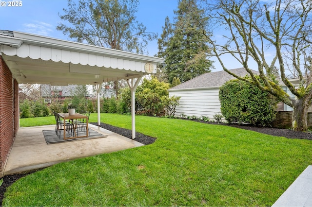 view of yard with a patio area