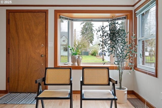 dining area featuring visible vents, baseboards, and wood finished floors