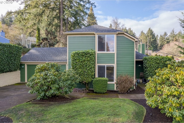 front facade with a front yard