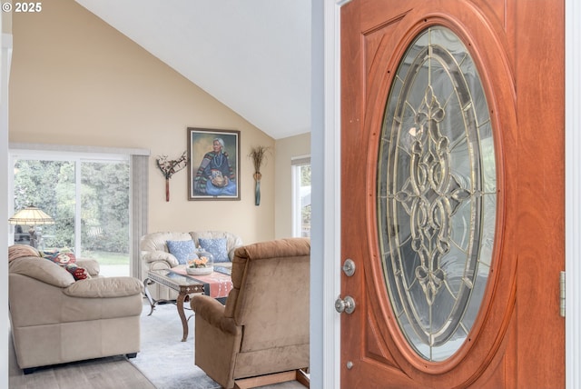 entryway with vaulted ceiling