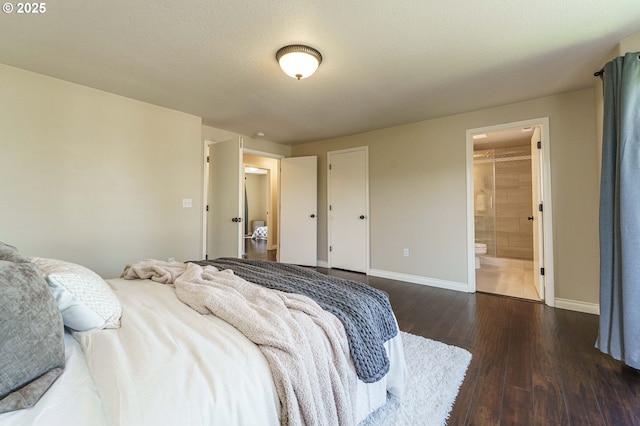 2614 NE 176th Ave, Vancouver, WA 98684 - bedroom featuring baseboards, wood finished floors, and connected bathroom