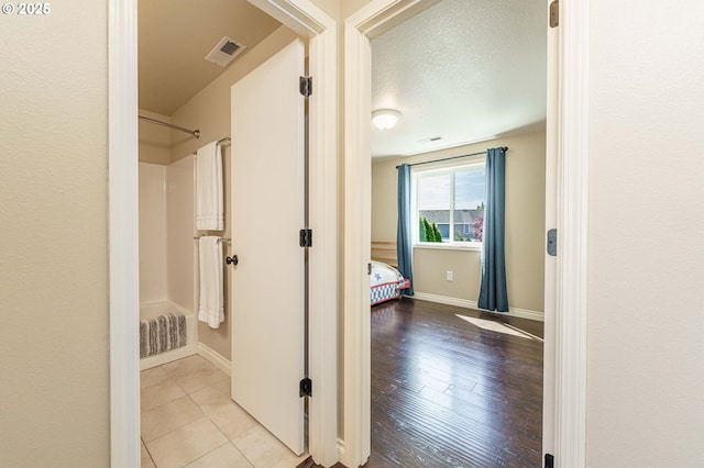 2614 NE 176th Ave, Vancouver, WA 98684 - hallway featuring baseboards and tile patterned flooring