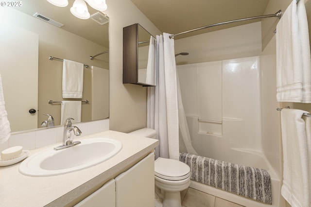 2614 NE 176th Ave, Vancouver, WA 98684 - bathroom featuring toilet, vanity, shower / tub combo with curtain, and tile patterned floors